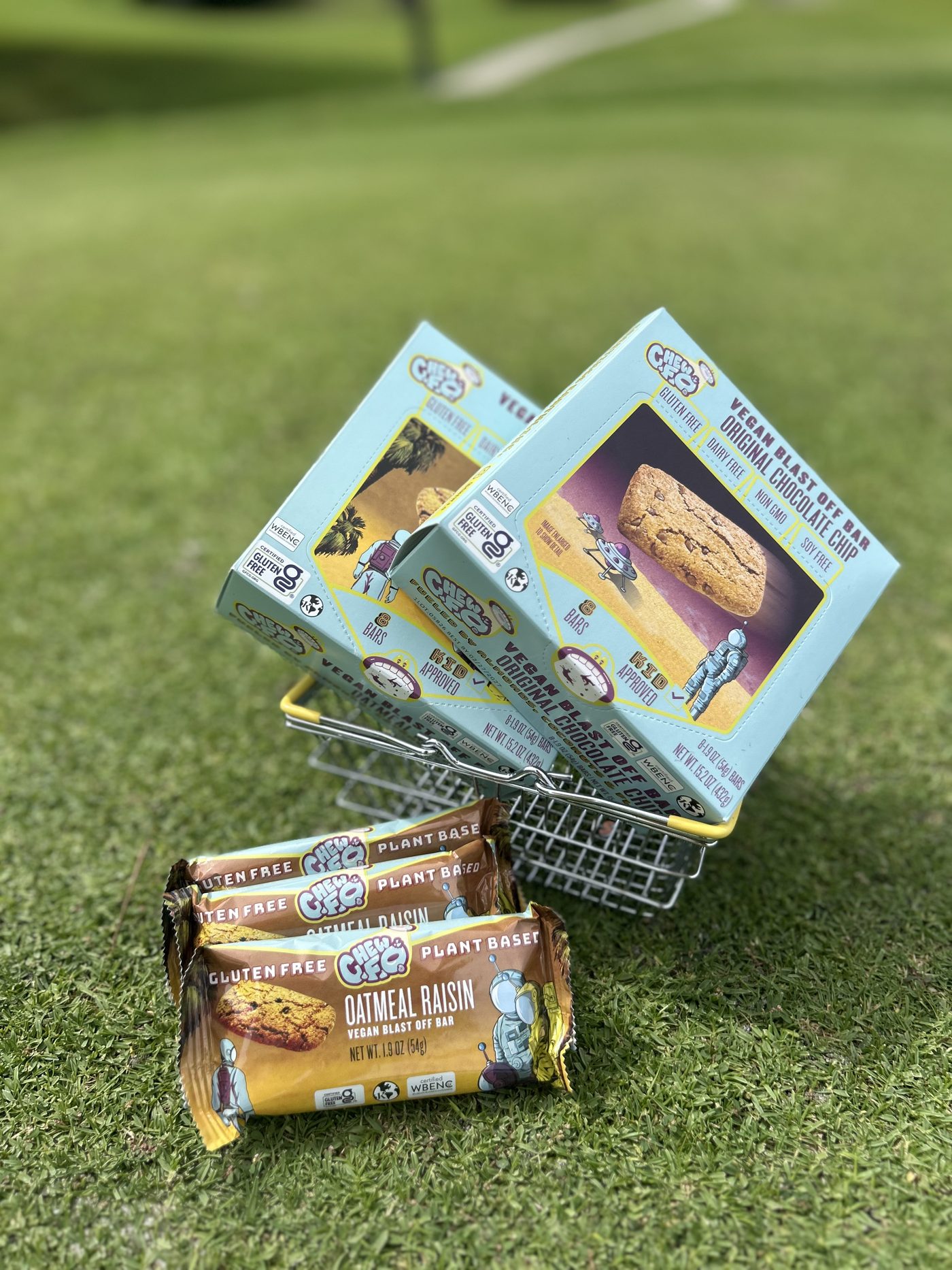 CHEW. F. O. bars in a shopping basket on the golf course
